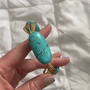 Large turquoise stone and gold bangle